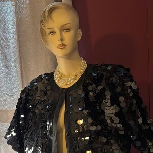 Glamorous Black Sequin Cape with V-Neckline and Textured Surface